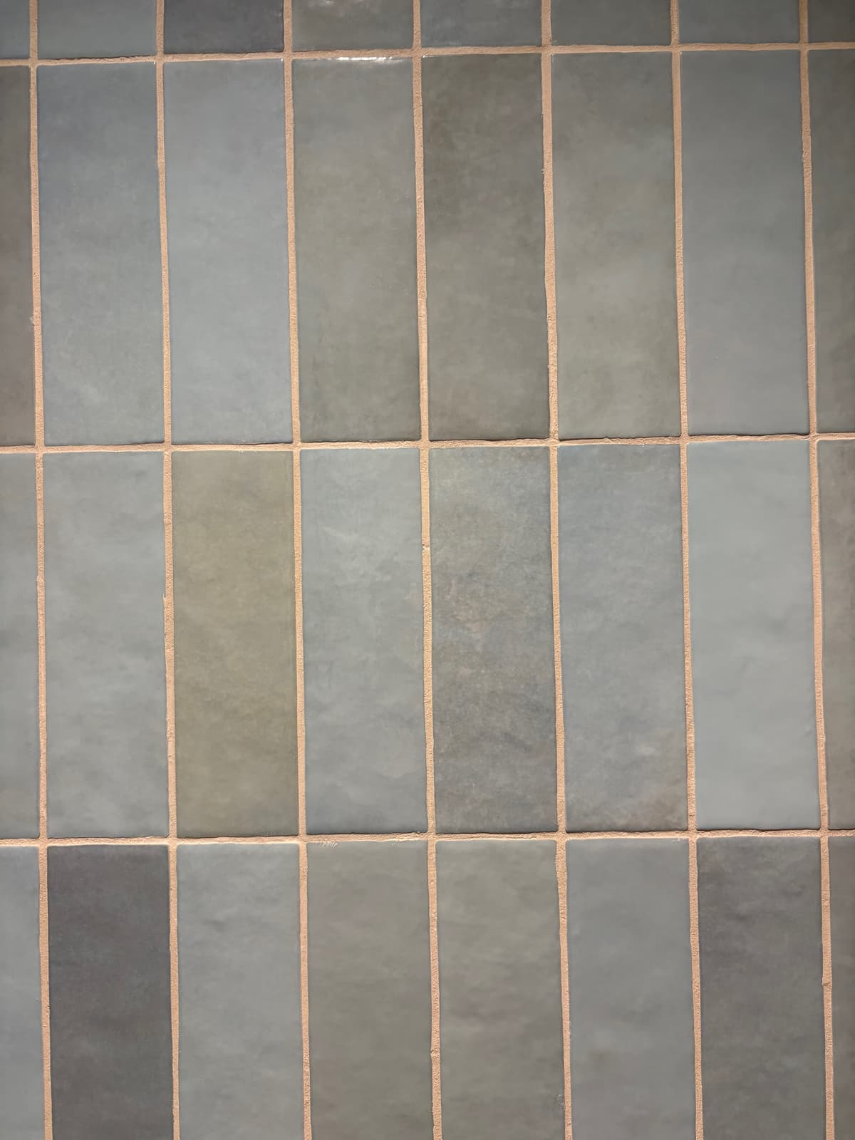 Blue-grey wall tiles, one of the finishes chosen for Navia Bathhouse Byron Bay